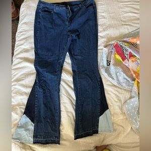 Reposh! Size 18W Dark wash flare jeans with patchwork detail.